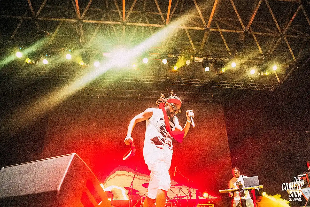 Machel Montano performing under stage lights at OVO Fest